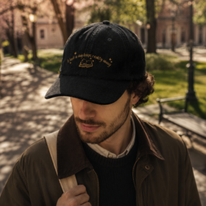 A Book a Day Keeps Reality Away — Black Corduroy Dad Hat | Book Lover Gift
