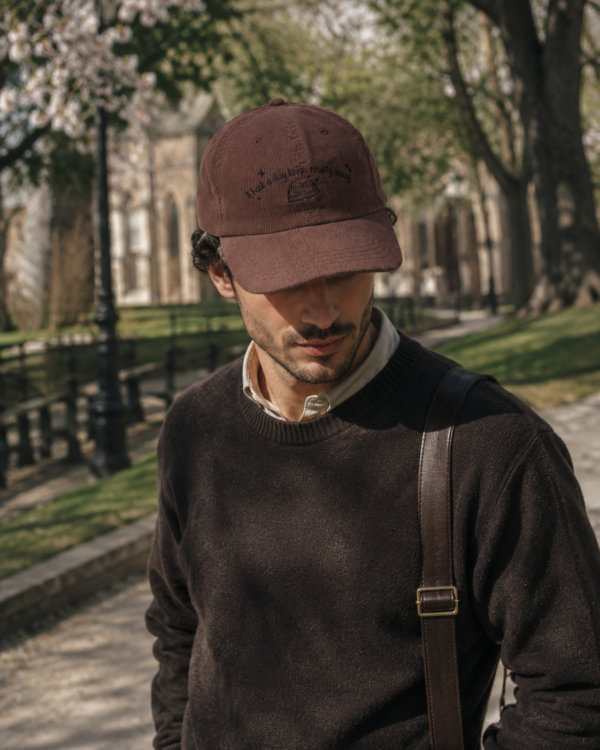 A Book a Day Keeps Reality Away — Dad Cap