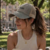 20260520222203-1f1549a5-3ed9-642a-b24b-fab128bf1e9f.png Books Ponytail Trucker Hat | Bookish Embroidered Cap