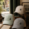 20260521214626-1f1555e8-494b-6148-a7c6-8666b624e02d.png Ember Brew Logo Ponytail Trucker Hat